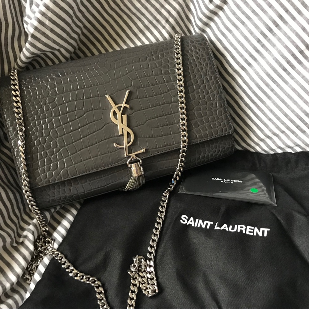 Authentic ❣️ YSL medium tassel clutch with chain